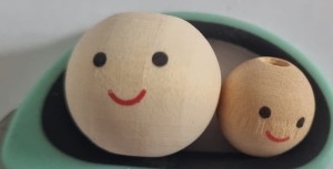 Koraliki 14mm drewno uśmiech 