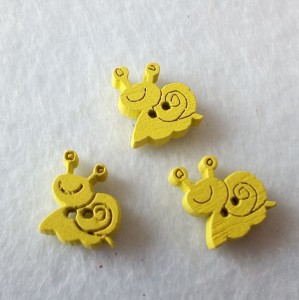 Guzik dziecięcy ślimak żółty