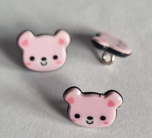 Guzik dziecięcy miś różowy 