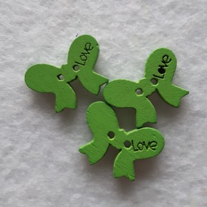 Guzik dziecięcy kokardka zielony